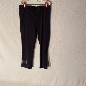 Under Armour black crop leggings with logo. In a size M.